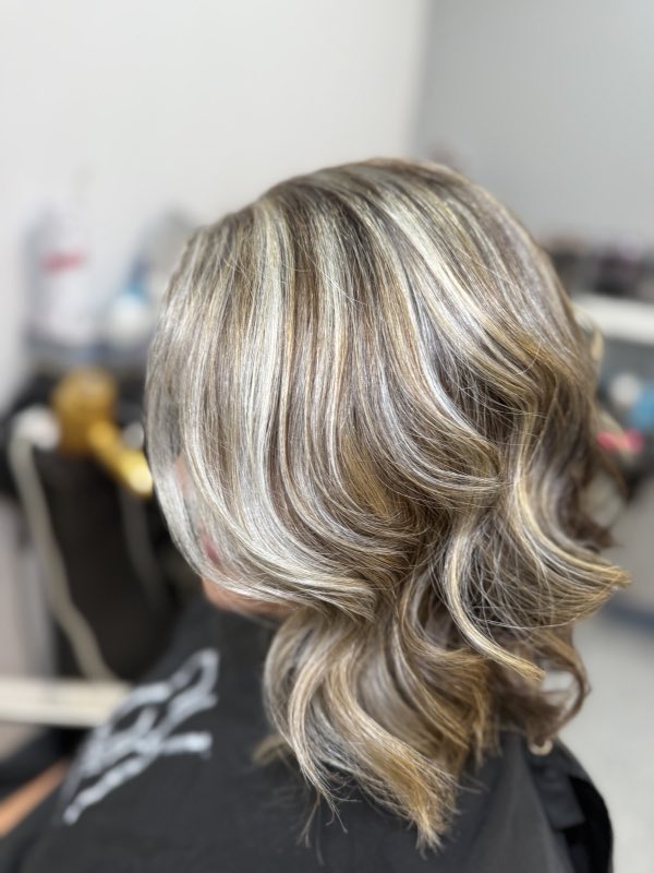 Blonde and silver balayage with soft curls