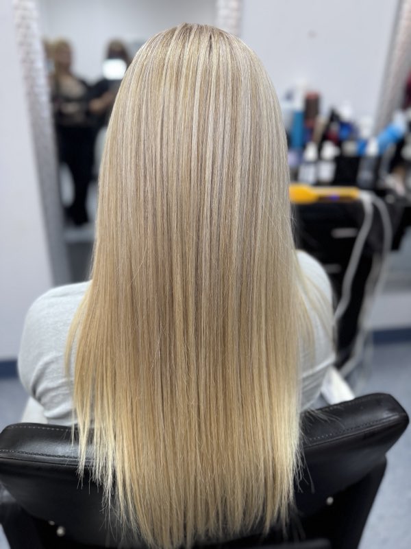 Long, sleek platinum blonde hair